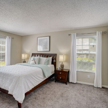 Large Primary Bedroom with Plush Carpet